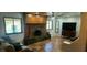 Cozy living room with fireplace and tile floors at 5312 Manuel Dr, Las Vegas, NV 89149