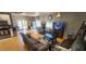 Living room with kitchen, hard wood floors and comfortable seating at 5312 Manuel Dr, Las Vegas, NV 89149