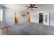Main bedroom featuring neutral walls and carpet, with adjoining bathroom and walk-in closet at 5312 Manuel Dr, Las Vegas, NV 89149