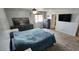 Spacious main bedroom with carpet, ceiling fan, dresser, and ample natural light at 5312 Manuel Dr, Las Vegas, NV 89149