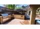 Outdoor kitchen and gazebo with dining, barbecue, and bar, creating a great entertainment area at 5312 Manuel Dr, Las Vegas, NV 89149