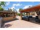 Spacious patio area features a covered seating area, built-in grill, and a bar, ideal for outdoor entertaining at 5312 Manuel Dr, Las Vegas, NV 89149