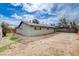 View of the backyard and exterior of the home at 5620 Pinecone Pl, Las Vegas, NV 89108