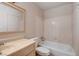 Bathroom features a bath tub and a single sink vanity with tile backsplash at 5620 Pinecone Pl, Las Vegas, NV 89108