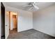 Well-lit bedroom features neutral walls, and convenient access to the closet and bathroom at 5620 Pinecone Pl, Las Vegas, NV 89108