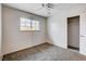 Cozy bedroom with a window and closet, offering a comfortable living space at 5620 Pinecone Pl, Las Vegas, NV 89108