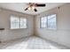 Dining area with tile floors and natural light from the surrounding windows at 5620 Pinecone Pl, Las Vegas, NV 89108