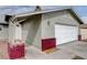 Charming single-story home features an attached two-car garage and a well-maintained front yard at 5620 Pinecone Pl, Las Vegas, NV 89108