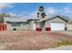 Charming single-story home with a well-maintained front yard and attached two-car garage at 5620 Pinecone Pl, Las Vegas, NV 89108