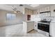 Kitchen with updated stainless steel oven and a breakfast bar at 5620 Pinecone Pl, Las Vegas, NV 89108