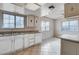 Well-lit kitchen with large windows and ample counter space at 5620 Pinecone Pl, Las Vegas, NV 89108