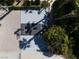Aerial view of a private basketball court next to lush landscaping and a garage at 5860 N Campbell Rd, Las Vegas, NV 89149