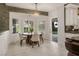 Charming breakfast nook with natural light, plantation shutters, and access to backyard at 5860 N Campbell Rd, Las Vegas, NV 89149