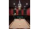 Cozy game room with pool table, lounge, and custom window shutters at 5860 N Campbell Rd, Las Vegas, NV 89149