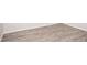 Close up on the light colored and modern hardwood flooring at 5860 N Campbell Rd, Las Vegas, NV 89149