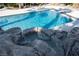The rock waterfall cascades into the spa, which then overflows into the sparkling pool at 5860 N Campbell Rd, Las Vegas, NV 89149