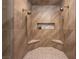 Modern shower with dual shower heads, tiled walls, and built-in marble corner seats at 5860 N Campbell Rd, Las Vegas, NV 89149