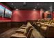 Spacious home theater with reclining chairs and a built-in projection screen at 5860 N Campbell Rd, Las Vegas, NV 89149