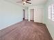 Bright bedroom featuring fresh mint walls and a spacious closet at 6053 Lambert Bridge Ave, Las Vegas, NV 89139
