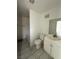 Bathroom featuring a bathtub and shower combo, toilet, sink and vanity at 641 West St, Pahrump, NV 89048