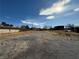 Exterior view of a spacious lot offering development possibilities and a versatile space at 641 West St, Pahrump, NV 89048