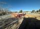 Exterior view of a red building showcasing its structure and surroundings under a bright blue sky at 641 West St, Pahrump, NV 89048