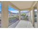 This balcony features a scenic view of the landscape, neighborhood, and pool at 65 Pangloss St, Henderson, NV 89002