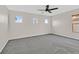 Bedroom with neutral walls and carpet flooring featuring a ceiling fan at 65 Pangloss St, Henderson, NV 89002