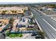 This aerial view shows the property's layout near major roadways and a glimpse of the mature landscaping at 6882 Palmyra Ave, Las Vegas, NV 89146