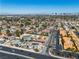 A neighborhood with a home with solar panels, with cityscape in the distance at 6882 Palmyra Ave, Las Vegas, NV 89146