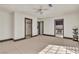 Bright bedroom featuring large closets and tile flooring at 6882 Palmyra Ave, Las Vegas, NV 89146