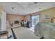 Tile floor living room with fireplace and sliding glass door at 6882 Palmyra Ave, Las Vegas, NV 89146
