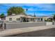 Charming single-story home featuring a well-maintained front yard and a quaint covered porch entrance at 700 Cactus Ln, Las Vegas, NV 89107