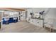 Stylish kitchen with a blue island, modern appliances, and ample counter space at 700 Cactus Ln, Las Vegas, NV 89107