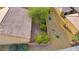 Aerial view showcasing a backyard space featuring desert landscaping, rock details, and a private sitting area at 7556 Wingspread St, North Las Vegas, NV 89084