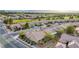 Overhead shot of a residential neighborhood with well-manicured lawns and mature trees at 7556 Wingspread St, North Las Vegas, NV 89084