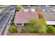 Overhead view of a single-Gathering home featuring well-manicured landscaping, desert rock features and spacious surroundings at 7556 Wingspread St, North Las Vegas, NV 89084