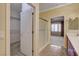Bright bathroom, with walk-in shower and open view to walk-in closet and bedroom at 7556 Wingspread St, North Las Vegas, NV 89084