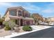 Charming two-story home featuring a well-manicured lawn and a two-car garage in a desirable neighborhood at 7641 Lani Dawn St, Las Vegas, NV 89149