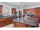Bright kitchen features stainless steel appliances, granite countertops, and a convenient center island at 7641 Lani Dawn St, Las Vegas, NV 89149