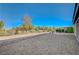 Low maintenance backyard with easy to care for landscaping and direct views of the community green spaces at 7760 Pine Warbler Way, North Las Vegas, NV 89084