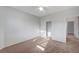 This is a bedroom with neutral walls and carpet, a ceiling fan, and closet at 7760 Pine Warbler Way, North Las Vegas, NV 89084