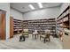Quiet library with extensive bookshelves, comfortable seating, and good lighting at 7760 Pine Warbler Way, North Las Vegas, NV 89084