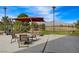 Relaxing outdoor seating area overlooking the golf course and mountains, ideal for enjoying serene views and fresh air at 7760 Pine Warbler Way, North Las Vegas, NV 89084
