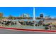 Beautiful water feature showcasing natural rocks, a tranquil pond, and a majestic fountain, adding charm to the community at 7760 Pine Warbler Way, North Las Vegas, NV 89084