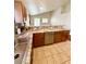 The kitchen features stainless appliances, tile floors, and granite countertops at 7821 Desert Bell Ave, Las Vegas, NV 89128