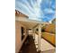 Covered patio with pavers, offering outdoor relaxation and enjoyment of the sunny weather at 7821 Desert Bell Ave, Las Vegas, NV 89128