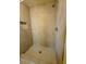 Shower stall with neutral-toned tile and a built-in niche for storage offers style and functionality at 7821 Desert Bell Ave, Las Vegas, NV 89128