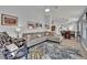 Inviting living room with a comfortable sectional sofa and stylish décor at 8009 Tailwind Ave, Las Vegas, NV 89131