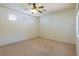 Bedroom featuring neutral carpet, recessed lighting, and a window allowing natural light at 8249 Jo Marcy Dr, Las Vegas, NV 89131